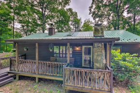 Quaint Cabin with Outdoor Fireplace and Sunroom!